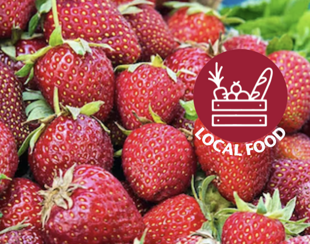 Pile of strawberries with Local Food spirit mark super-imposed